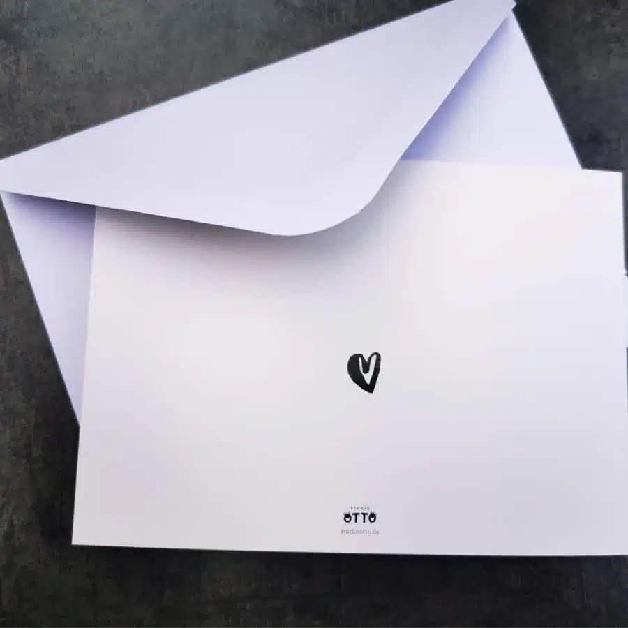 Rückseite einer Trauerkarten, ein schwarzes Aquarell Herz.